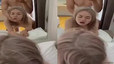Fucking the blonde girl in front of the mirror while playing and talking